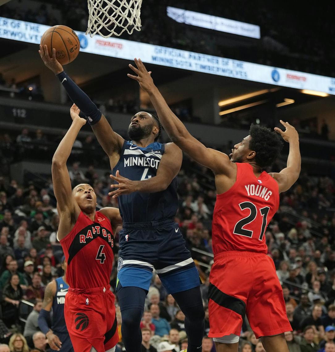 Russell scores 16 points in 4th, Wolves beat Raptors 128-126