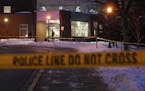 Police tape and squad cars are seen outside the Jimmy Lee Recreation Center on Jan. 18, where a teenager was shot.