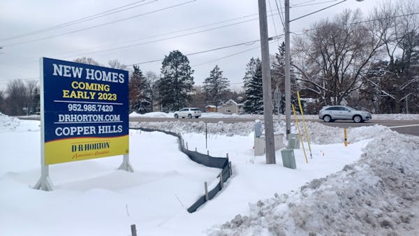 A sign at the intersection of Radio Drive and Dale Road marks the spot where home builder D.R. Horton plans to build a 112-home, 70-attached townhome 