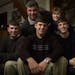 In their St. Paul home in December 2001, Joe Mauer, center, is surrounded by his family, his older brother Jake III, left, his younger brother Billy,