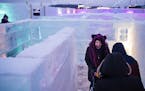 Malissa Medina helps Kevin Sullivan, who uses a walker, navigate the Minnesota Ice Maze in Eagan, Minn., on Thursday, Jan. 12, 2023.