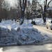 A sidewalk entrance was blocked by snow chunks Monday at the intersection of E. 1st Street and N. Hawthorne Road in Duluth.
