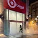 A fire was set inside the entrance to the Target Express on the corner of W. Lake Street and S. Fremont Avenue in Minneapolis about 3:30 a.m. Tuesday.