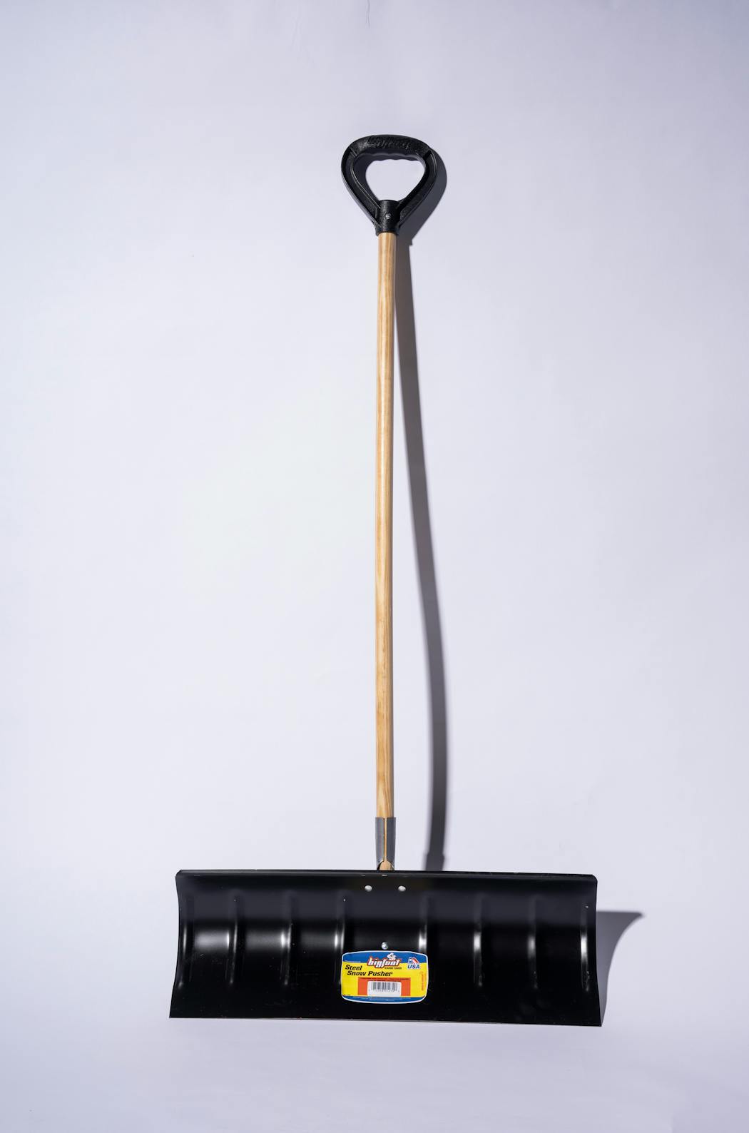 The plow-style shovel, a Bigfoot Steel Snow Pusher.