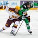 Jackson LaCombe of the Gophers tangled with North Dakota’s Matteo Costantini (18) during an early season game at 3M Arena at Mariucci. LaCombe’s t