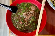 In boat noodle soup, a rich beef broth is perfumed with warm Burmese spices and served over rice noodles packed with fresh herbs.