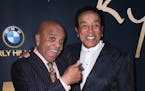 Founder of the Motown record label Berry Gordy, left, and Smokey Robinson arrive for the Ryan Gordy Foundation 60 Years of Motown Celebration at the W