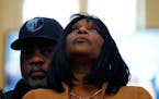 RowVaughn Wells, mother of Tyre Nichols, who died after being beaten by Memphis police officers, is comforted by Tyre’s stepfather Rodney Wells, at 
