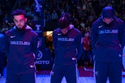 Memphis Grizzlies players bowed their heads in a moment of silence to honor Tyre Nichols ahead of their game Friday against the Timberwolves in Minnea