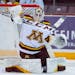 Gophers goalie Justen Close made a save against Michigan State on Friday night at 3M Arena at Mariucci.