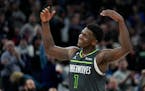 Minnesota Timberwolves guard Anthony Edwards (1) celebrates during the final seconds of a win over the Houston Rockets in an NBA basketball game, Satu