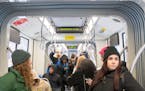 Passengers rode a light-rail train in downtown Minneapolis earlier in the week. Metro Transit fare dodgers can be charged with a misdemeanor and fined