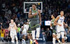 Minnesota Timberwolves guard Anthony Edwards (1) reacts after hitting a three-point-shot with 16 seconds left in the fourth quarter to ice the game ag
