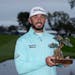 Max Homa held the trophy after winning the Farmers Insurance Open n San Diego.