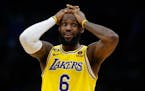 The Lakers’ LeBron James reacts during the second half of the team’s game against the Celtics