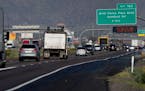 Traffic moves along the notoriously congested stretch of I-10 through tribal land called the Wild Horse Pass Corridor, Wednesday, Jan. 25, 2023 in Cha
