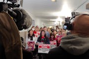 Nurses with the Minnesota Nurses Association joined with medical students from the University of Minnesota and other labor organizations on Monday to 