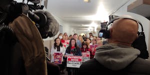 Nurses with the Minnesota Nurses Association joined with medical students from the University of Minnesota and other labor organizations on Monday to 