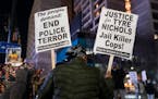 Demonstrators in Atlanta protest police violence following the release of video of the death of Tyre Nichols, on Friday, Jan. 27, 2023. Cities across 