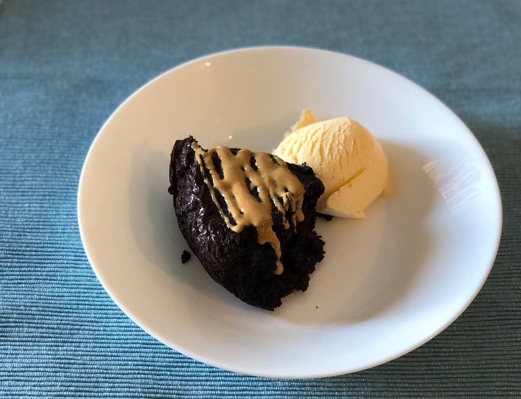 Top this dark chocolate cake with peanut butter, caramel, ice cream, whipped cream or just take it in with a big glass of milk.
