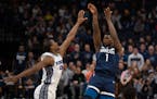 Minnesota Timberwolves guard Anthony Edwards (1) put up three of his game high 33 points in the fourth quarter over Sacramento Kings forward Harrison 