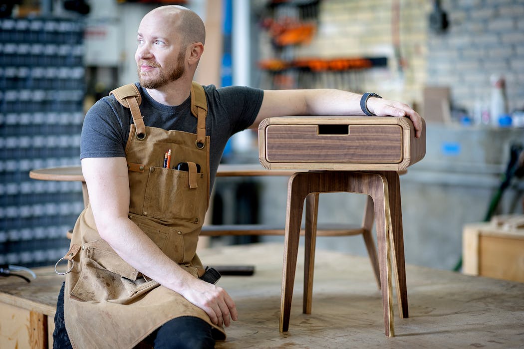 Justin Hossle of Hossle Woodworks in Minneapolis makes midcentury-inspired pieces, including a line he calls EOS, inspired by the Greek goddess of dawn.