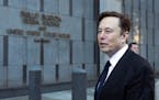 FILE - Elon Musk departs the Phillip Burton Federal Building and United States Court House in San Francisco, on Tuesday, Jan. 24, 2023. Tesla has rece