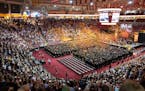 Confetti is fired at the conclusion of the University of Minnesota’s College of Science and Engineering graduation in May 2022 at 3M Arena at Mariuc