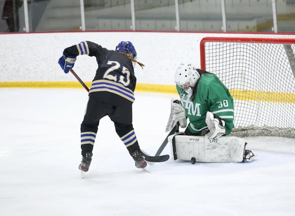 Hill-Murray goaltender Grace Zhan made a save Monday, part of a 4-0 victory over Holy Angels in a game pitting the No. 2 team in 2A and the No. 2 team