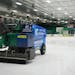 Arena maintenance coordinator Hunter Sieve drove a Zamboni while cleaning a sheet of ice at Braemar Arena in Edina on Tuesday. Edina is trying to hire