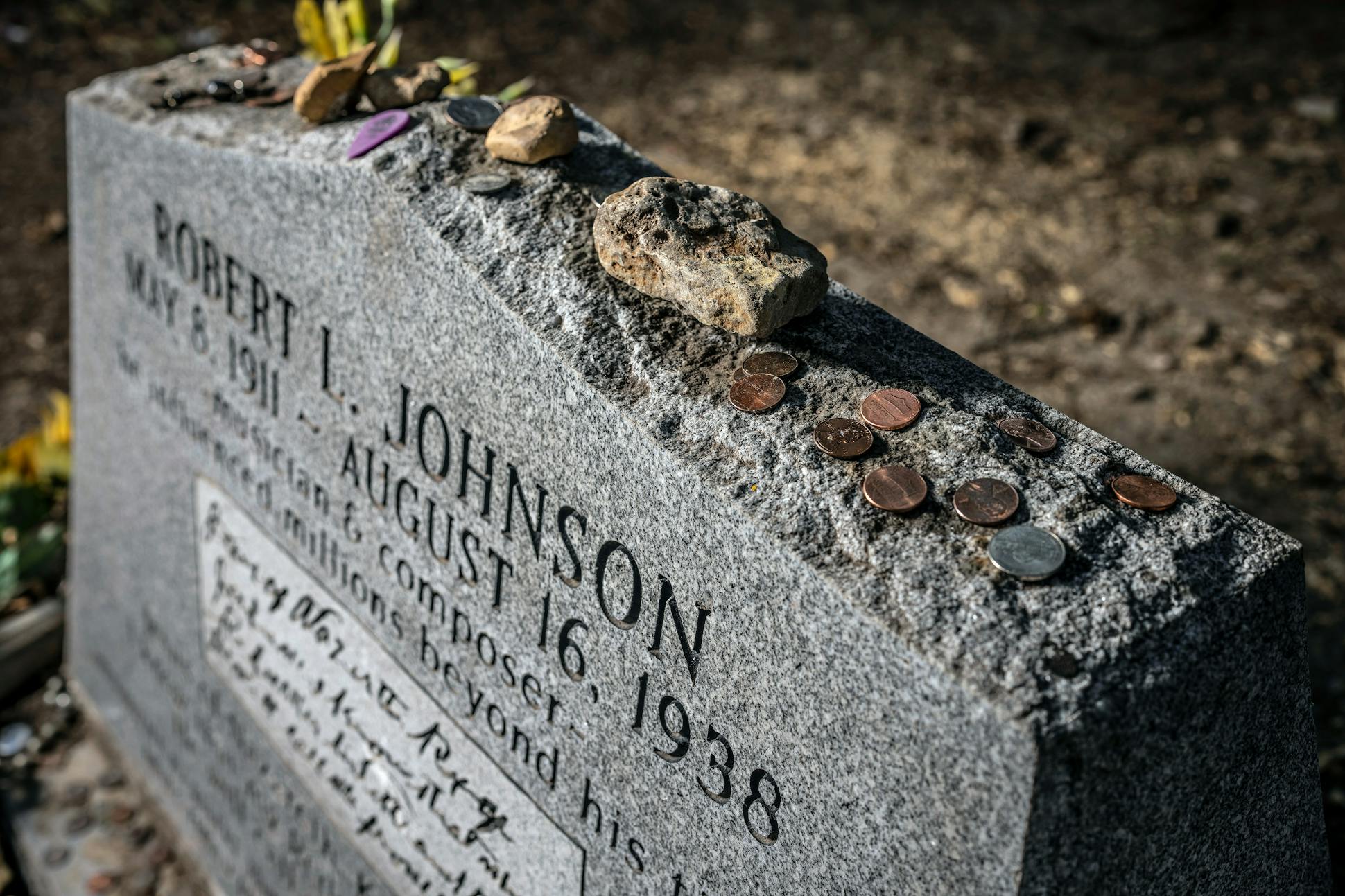 Blues fans make the pilgrimage to Robert Johnson's grave in Greenwood, leaving coins, guitar picks and other mementos.