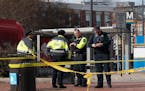 Washington Metropolitan Police officers investigate a shooting at Potomac Avenue Metro Station, in Southeast Washington, Wednesday, Feb. 1, 2023.