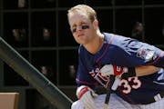 Justin Morneau waits to bat in this 2013 file photo. On Saturday he’ll host the Justin Morneau Ice Fishing Classic on Mille Lacs.