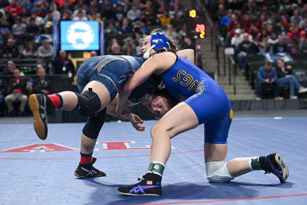 Skylar Little Soldier, right, wrestled Bemidji’s Kylie Donat in the 132-pound final at the first girls wrestling high school state championships in March.