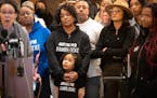 Amir Locke’s mom, Karen Wells, held on to her granddaughter and Amir’s niece Zury Locke, 6, during a rally Thursday in St. Paul.