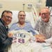 Jamie Green with his brother, John, left, and Twins great Bert Blyleven, right, in the hospital after suffering a heart attack during a Twins fantasy 