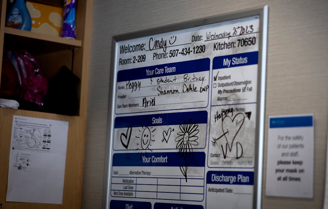 Cindy Hagen’s hospital room is covered with messages and how-to posters, including a Valentine’s Day note.