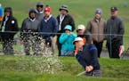 Kurt Kitayama hits the ball out of a bunker onto the sixth green of the Pebble Beach Golf Links during the second round of the AT&T Pebble Beach Pro-A