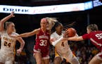 Center Rose Micheaux (shown in a Feb. 1 game vs. Indiana) was again an offensive force with 24 points and 11 rebounds, but the Gophers lost 69-62 at I