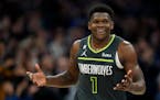Guard Anthony Edwards celebrated his buzzer-beating three pointer to end the third quarter as the Timberwolves thrashed the Nuggets 128-98 at Target C