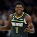 Guard Anthony Edwards celebrated his buzzer-beating three pointer to end the third quarter as the Timberwolves thrashed the Nuggets 128-98 at Target C