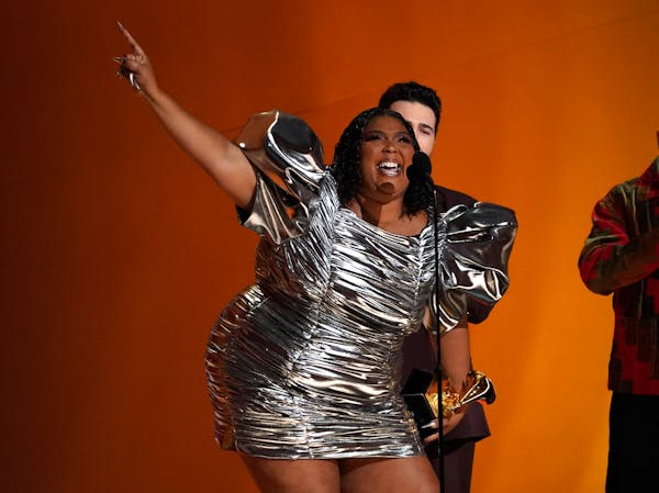 Lizzo accepts the award for record of the year for “About Damn Time” at the 65th annual Grammy Awards on Sunday, Feb. 5, 2023, in Los Angeles.