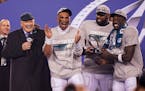 FILE - Terry Bradshaw, left, stands on stage with Philadelphia Eagles players from left, Jalen Hurts, Fletcher Cox and A.J. Brown after the NFC Champi