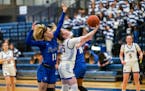 Wayzata’s Brynn Senden tried a reverse layup against Hopkins’ Jazmine Dupree-Hebert when those teams met in mid-January, a Hopkins victory. They m