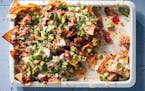 Bricklayer-style nachos ensures that there’s meat and cheese in every bite.