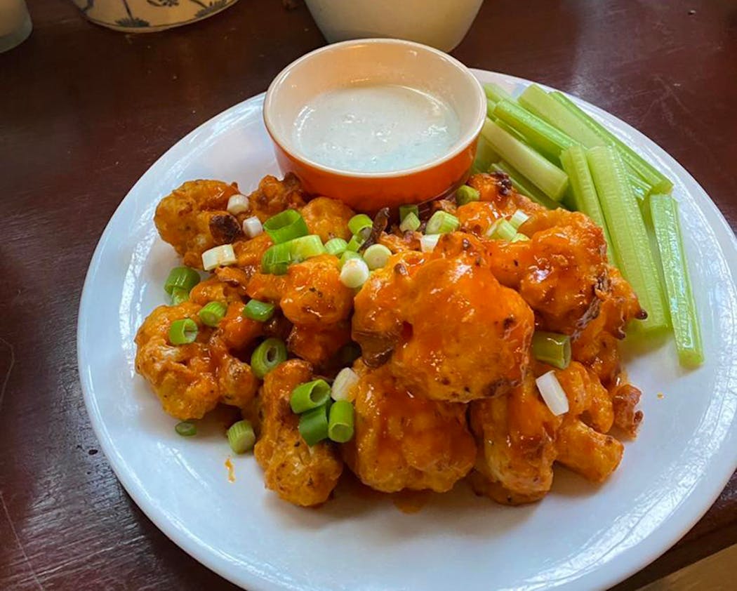 Cauliflower makes a meaty stand-in for chicken in these Buffalo “wings.”