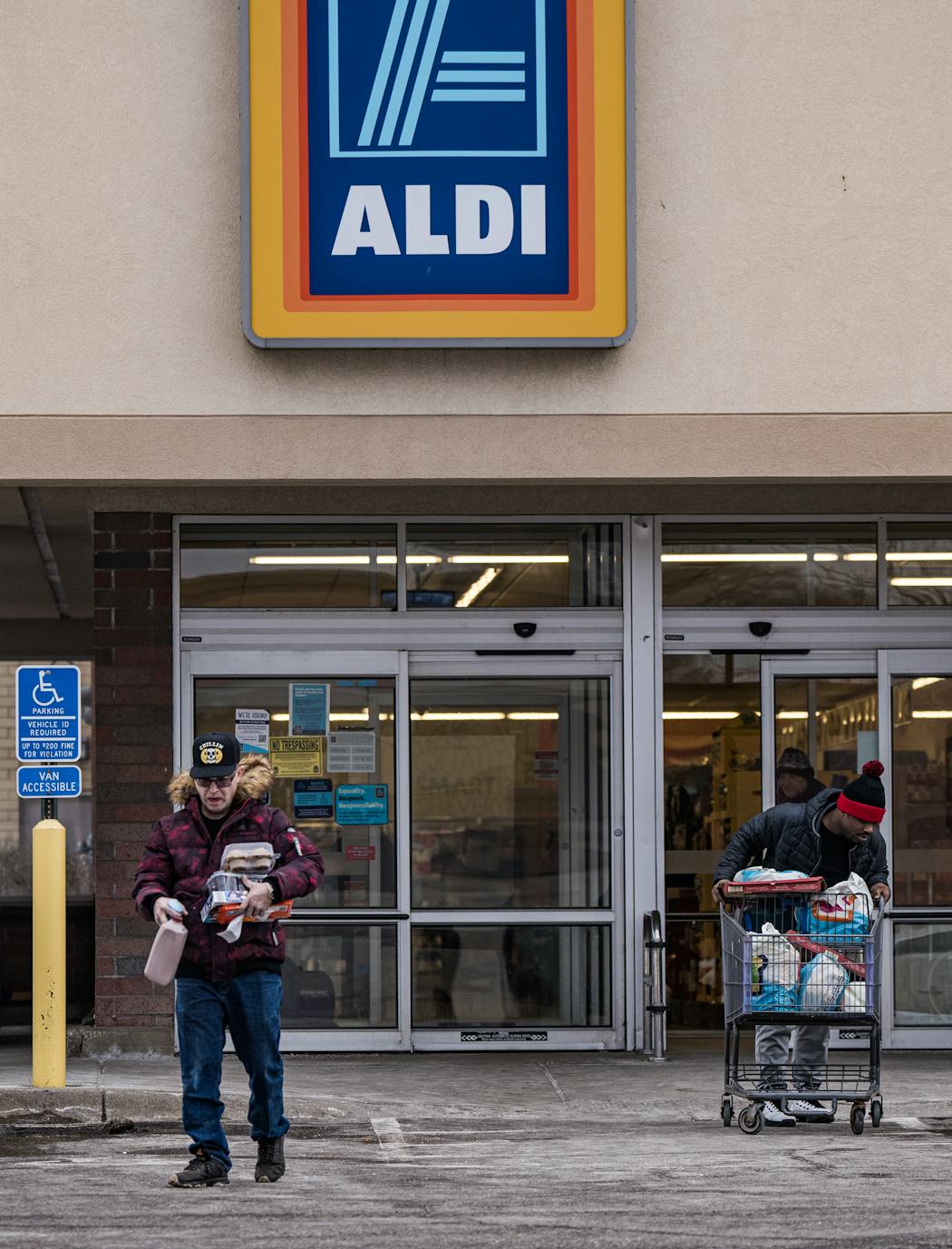 Customers come in and out of Aldi’s North Minneapolis location on Monday, Feb. 6, 2023. The store will be closing this Sunday.