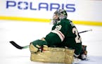 Minnesota Wild goaltender Marc-Andre Fleury stretches during an NHL hockey game against the Arizona Coyotes Saturday, Jan. 14, 2023, in St. Paul, Minn
