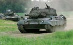 FILE - A Leopard 1 tank drives in Storkau, Germany, on May 19, 2000.