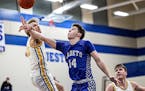 St. Thomas Academy surges past Mahtomedi in boys basketball